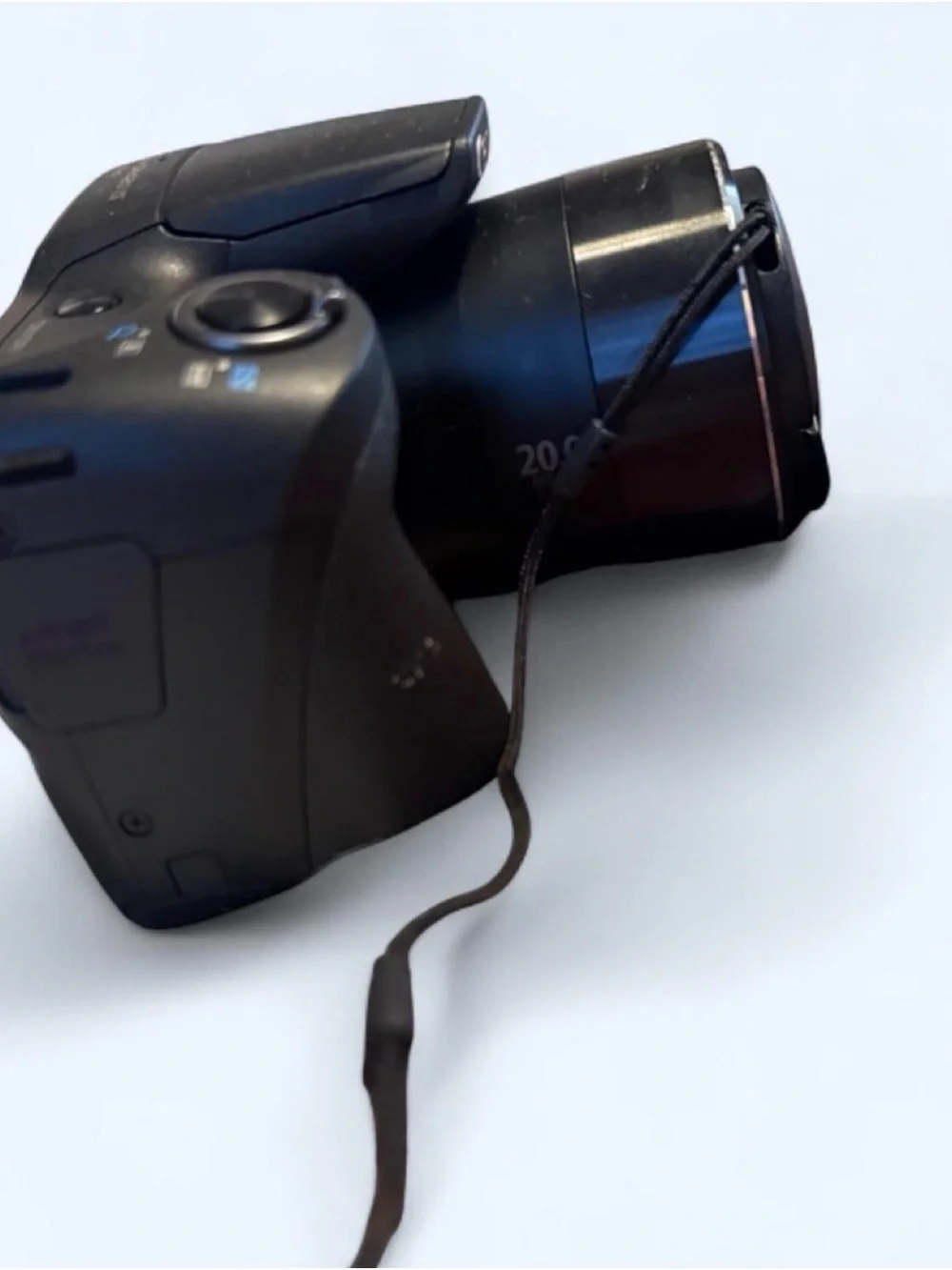 Canon PowerShot SX420 IS Digital Camera with Lens Cover, wrist wrap, and battery